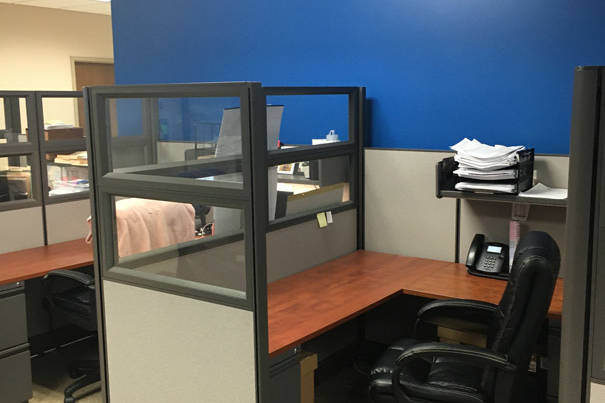 2 cubicles with L-shaped desks