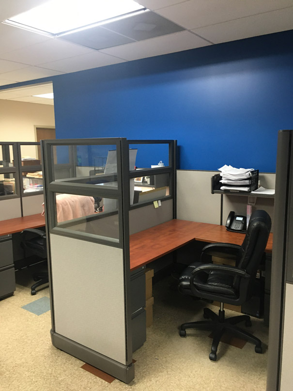 2 cubicles with L-shaped desks